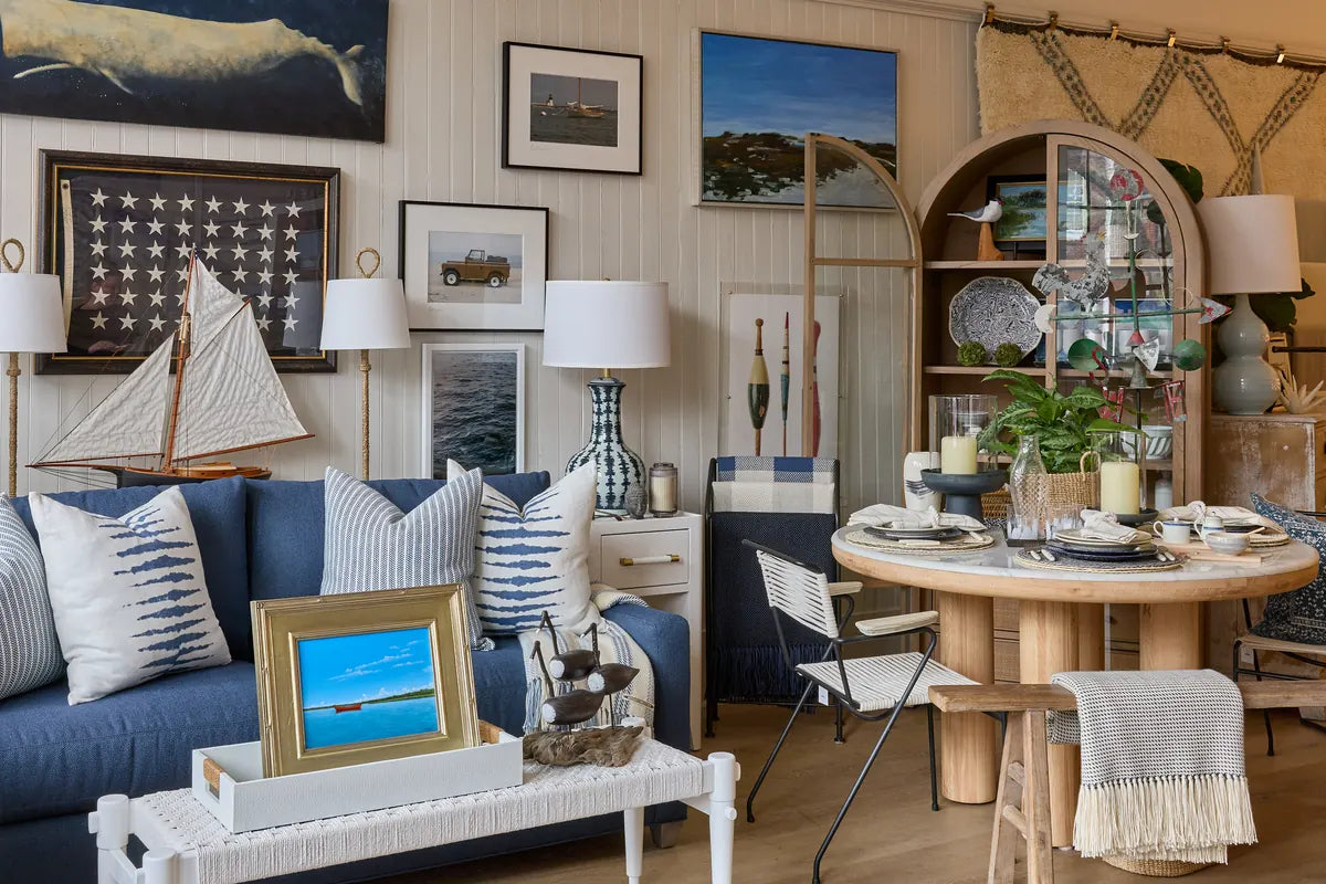 Nantucket Looms showroom with coastal decor, sailboat model, and nautical artwork on Main Street