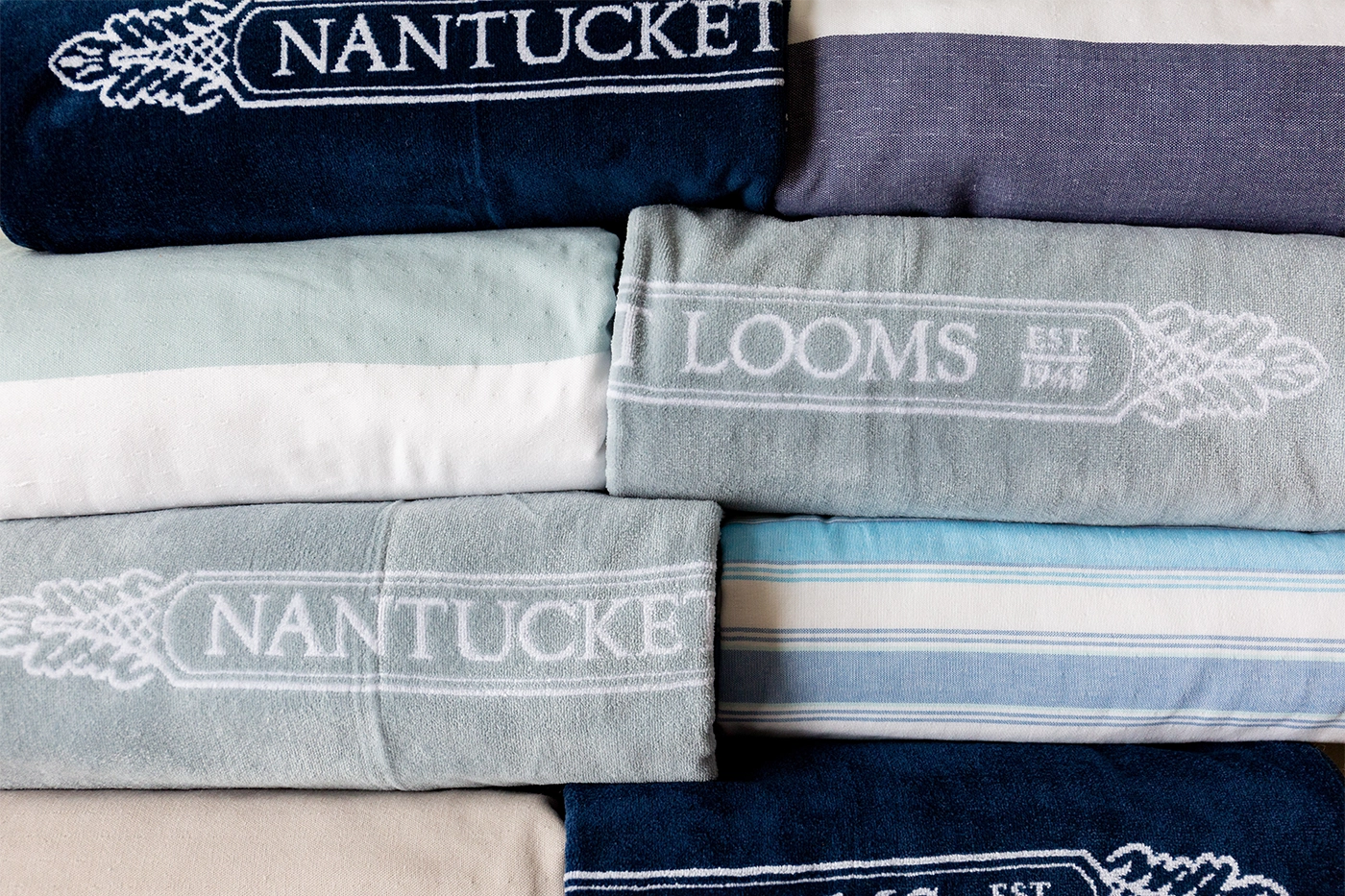 Embrace the epitome of coastal luxury with the Nantucket Looms Beach Towels. Perfect for sun-soaked days and seaside adventures, these towels are meticulously crafted to provide the ultimate blend of style and functionality.