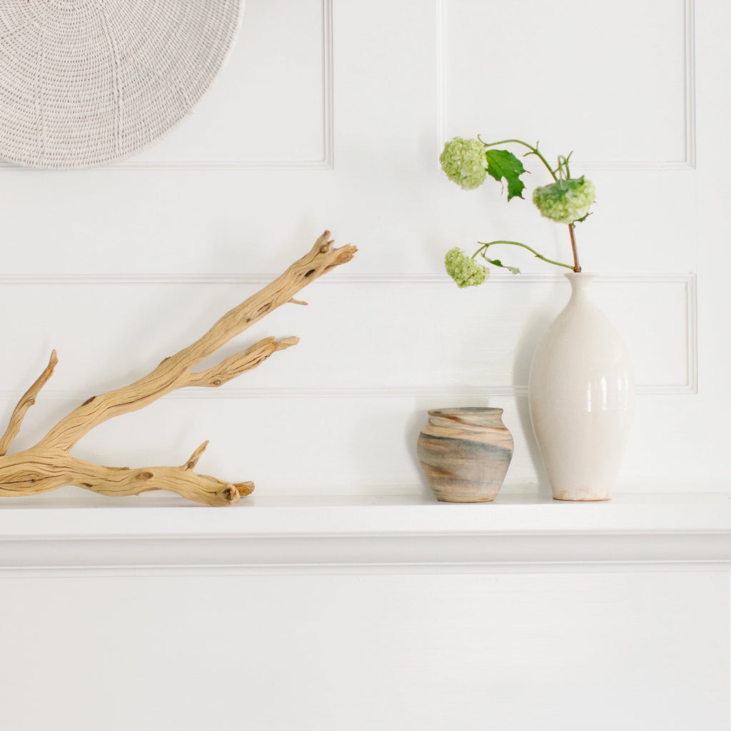 Introducing the Classic Aged Vases from Nantucket Looms, where timeless elegance meets artisanal craftsmanship. Each vase in this collection is a testament to meticulous attention to detail and a love for traditional design, making them perfect for any home setting.